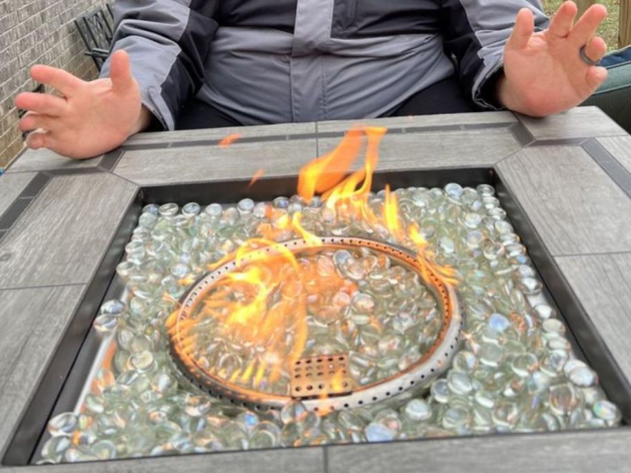 A Member's mark fire pit table