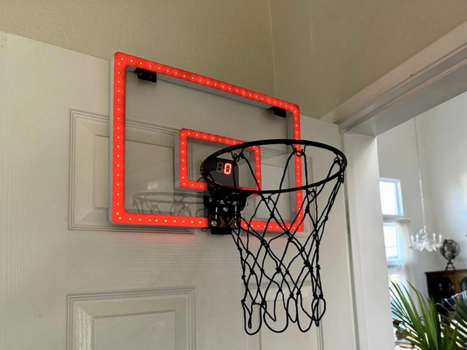 light up basketball hoop hanging over a bedroom door