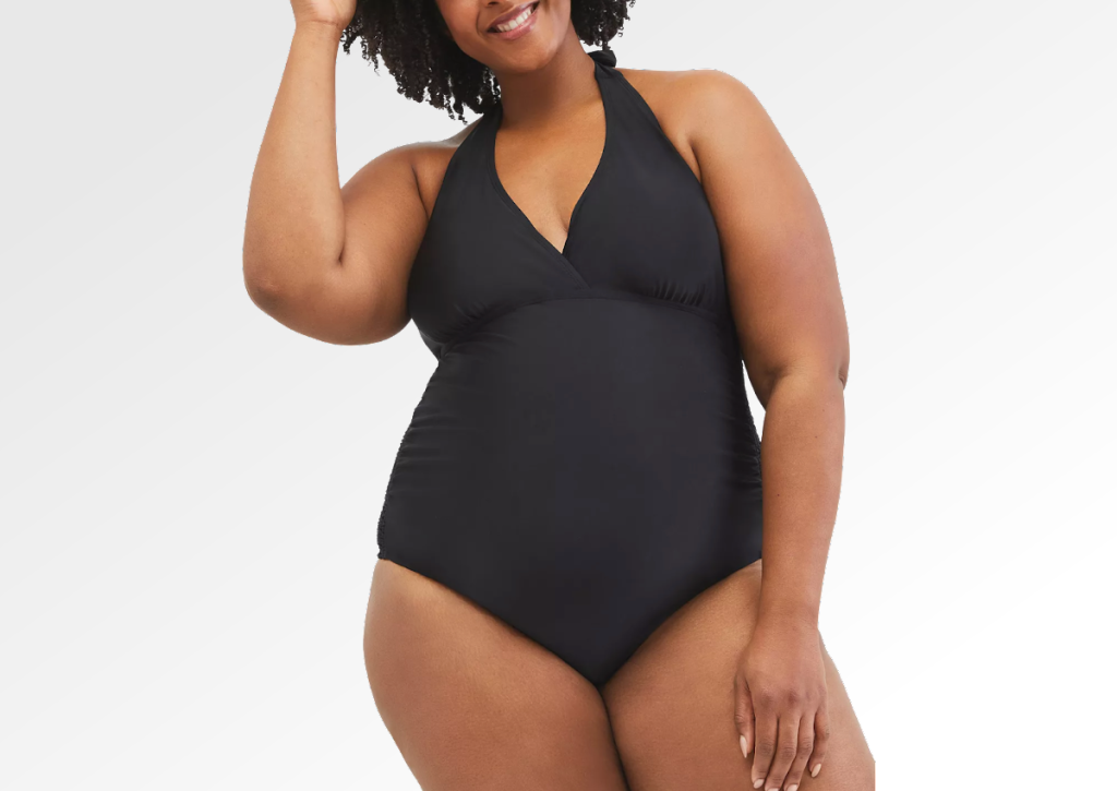 woman wearing a black Motherhood Maternity Plus Size swimsuit
