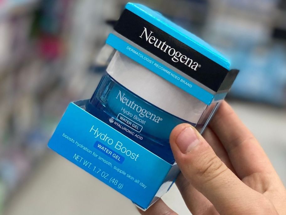 hand holding a box of Neutrogena Hydro Boost moisturizer