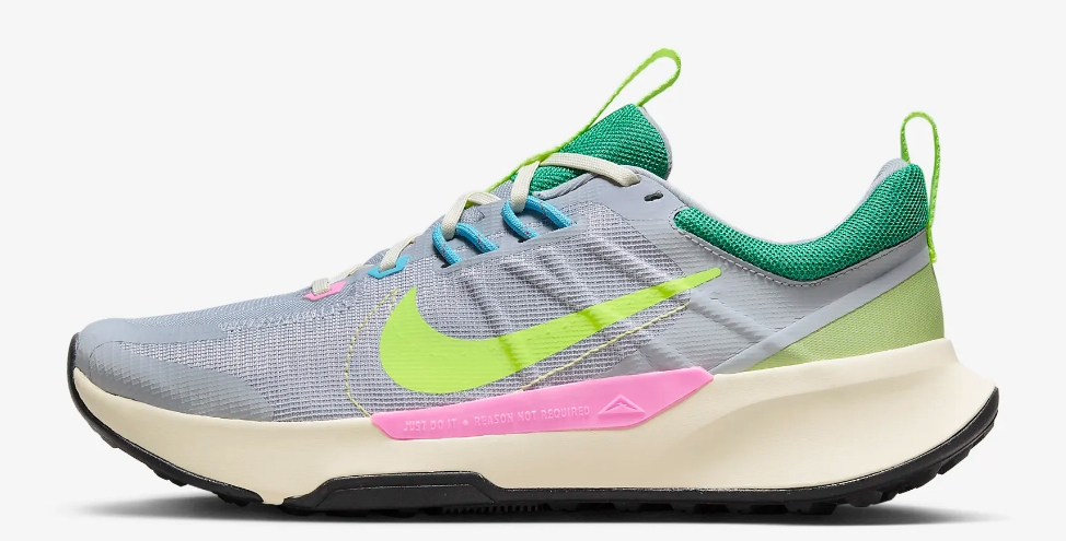 Yellow, pink, grey, and green trail running shoe