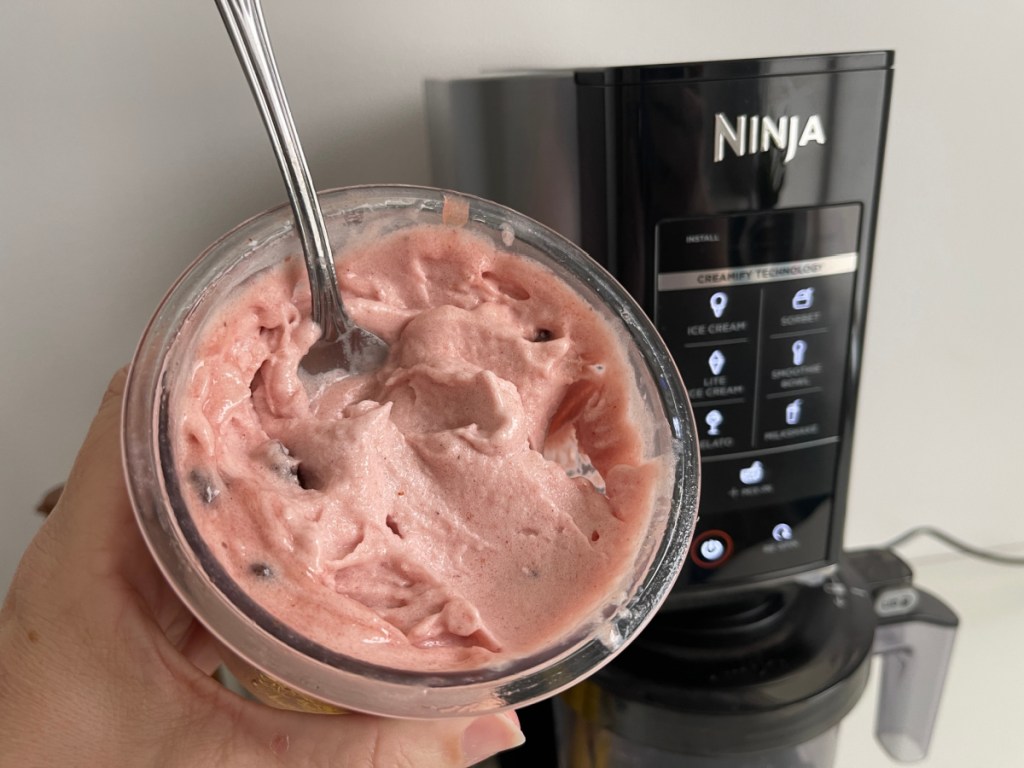 Ninja Creami ice cream maker with homemade ice cream being served at a summer party