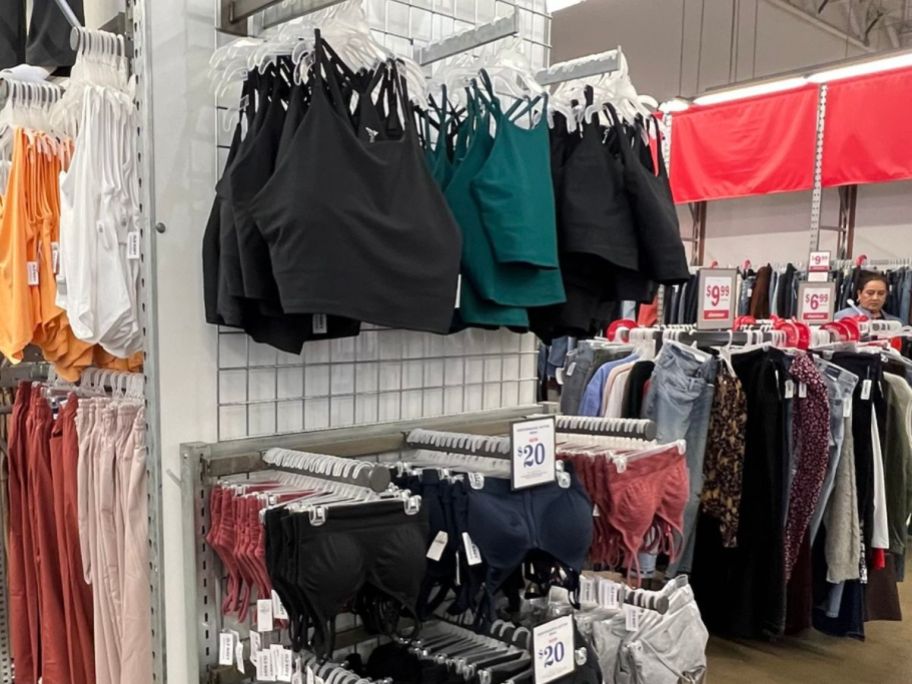 wall of women's sports bras hanging up at Old Navy