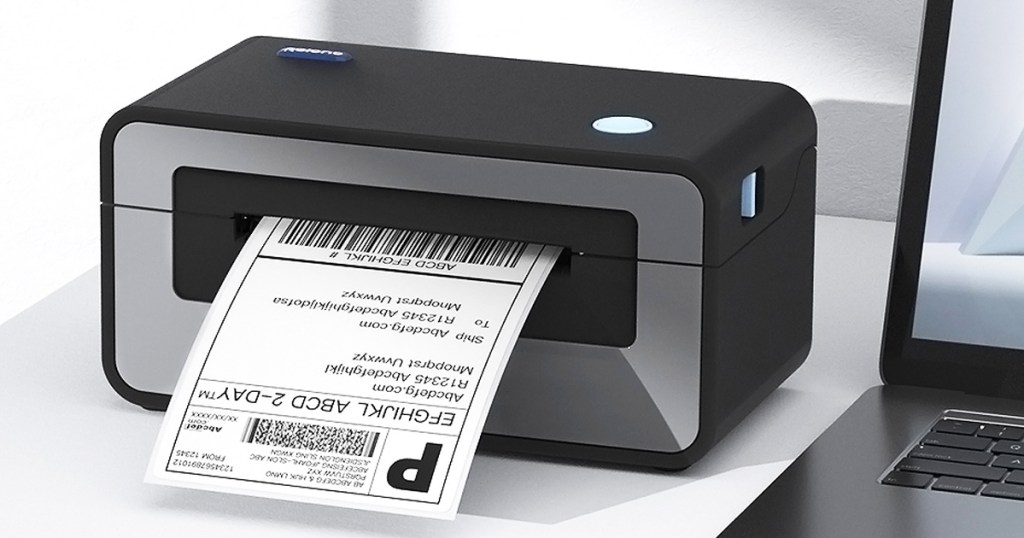black and grey printer printing a shipping label