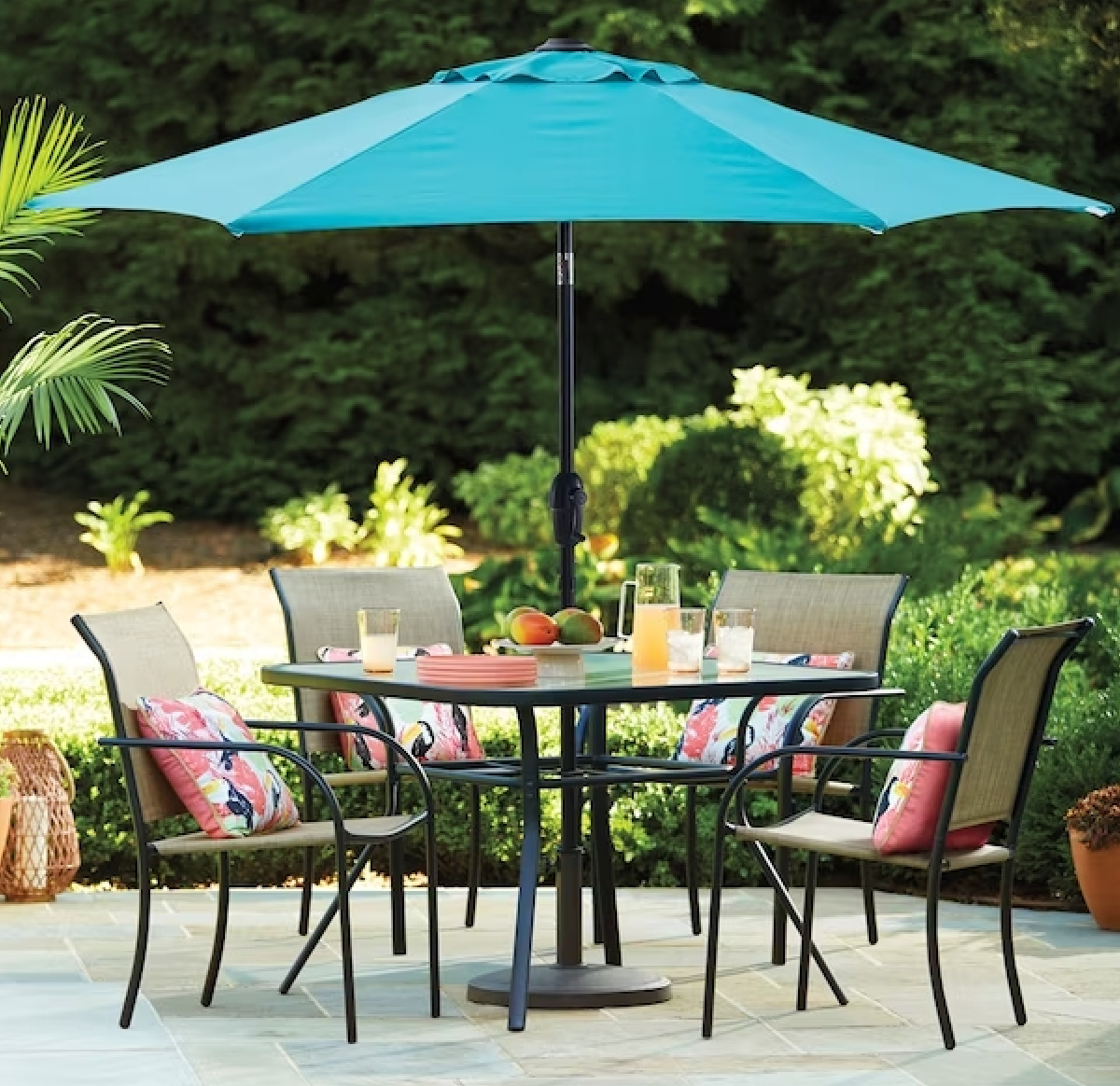 Lowes Patio umbrella over an outdoor dining table
