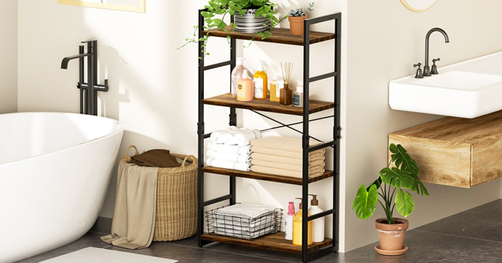 4-tier bookcase in bathroom with towels and decor on it