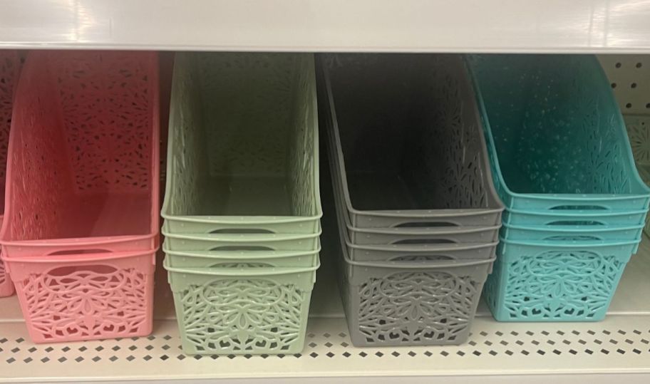 Plastic Book Storage Bins in 4 stacks on a store shelf