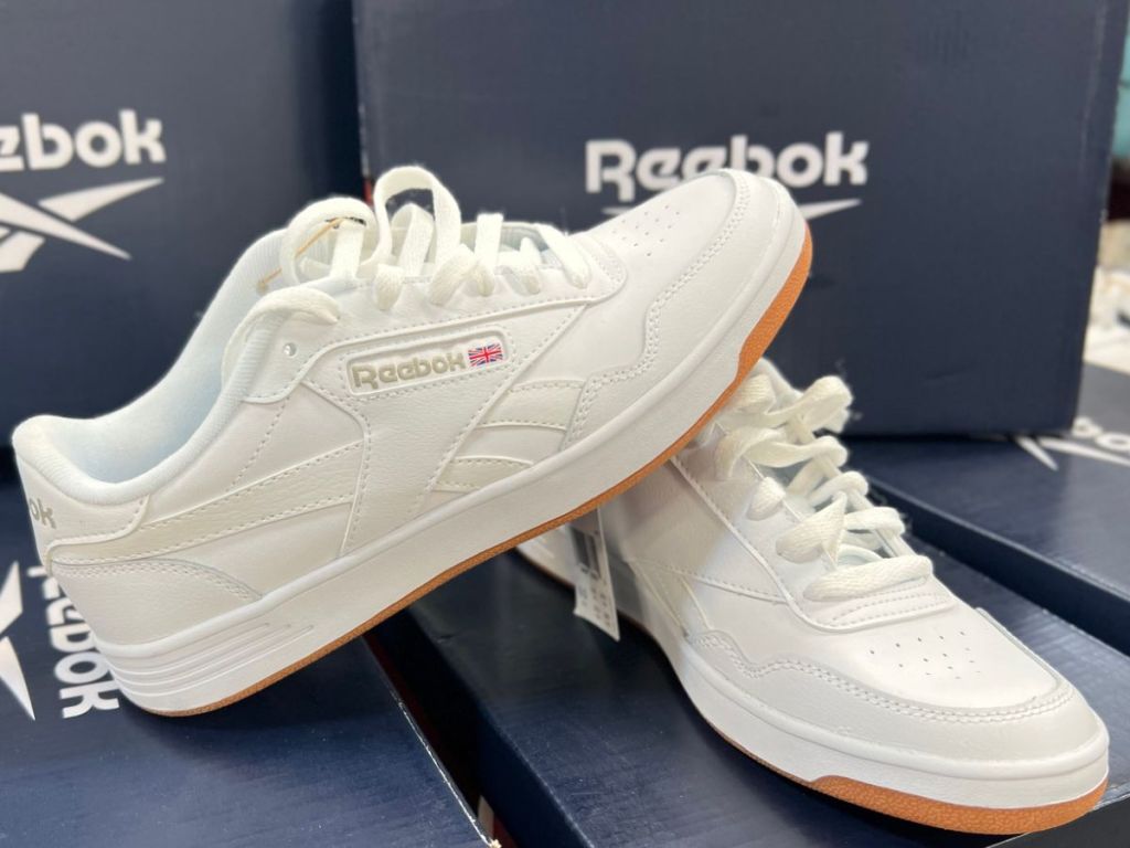 White Reebok sneakers on a blue Reebok box