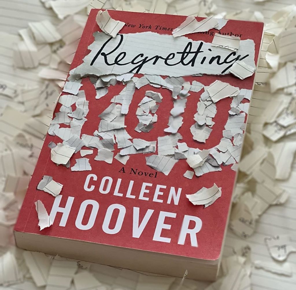 Regretting You Colleen Hoover book with scraps of paper around it