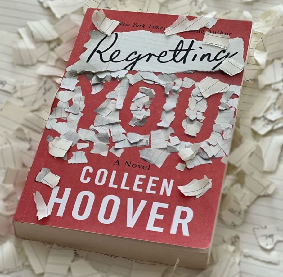 Regretting You Colleen Hoover book with scraps of paper around it