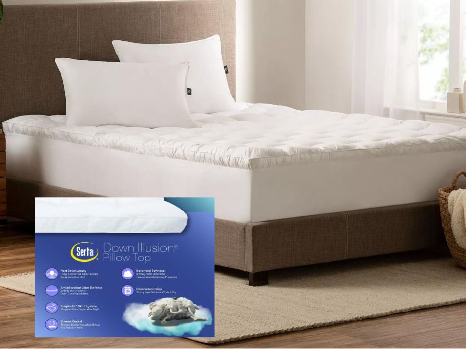 Serta Down Antimicrobial Illusion Pillowtop Mattress Topper on bed in bedroom with product box on the flloor in front of it