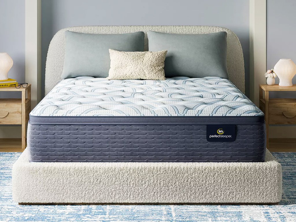 serta mattress on a white bed frame with matching headboard