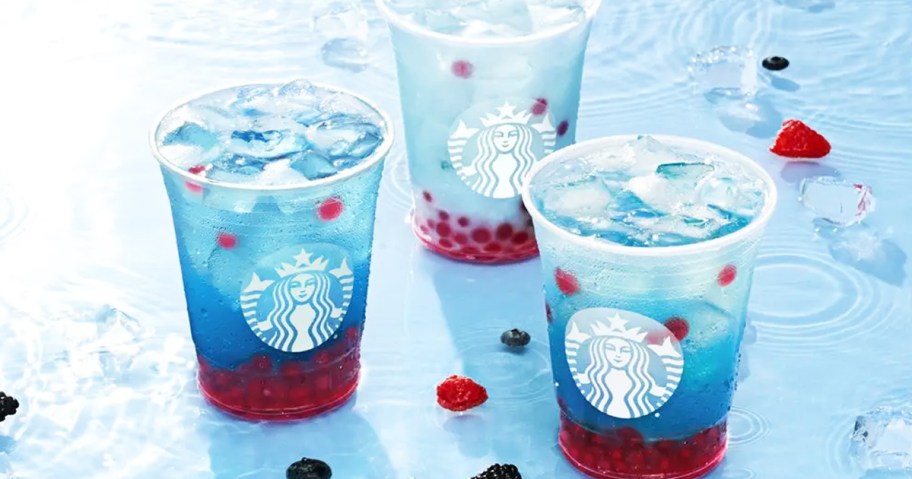 three blue and red Starbucks Summer-Berry Refreshers