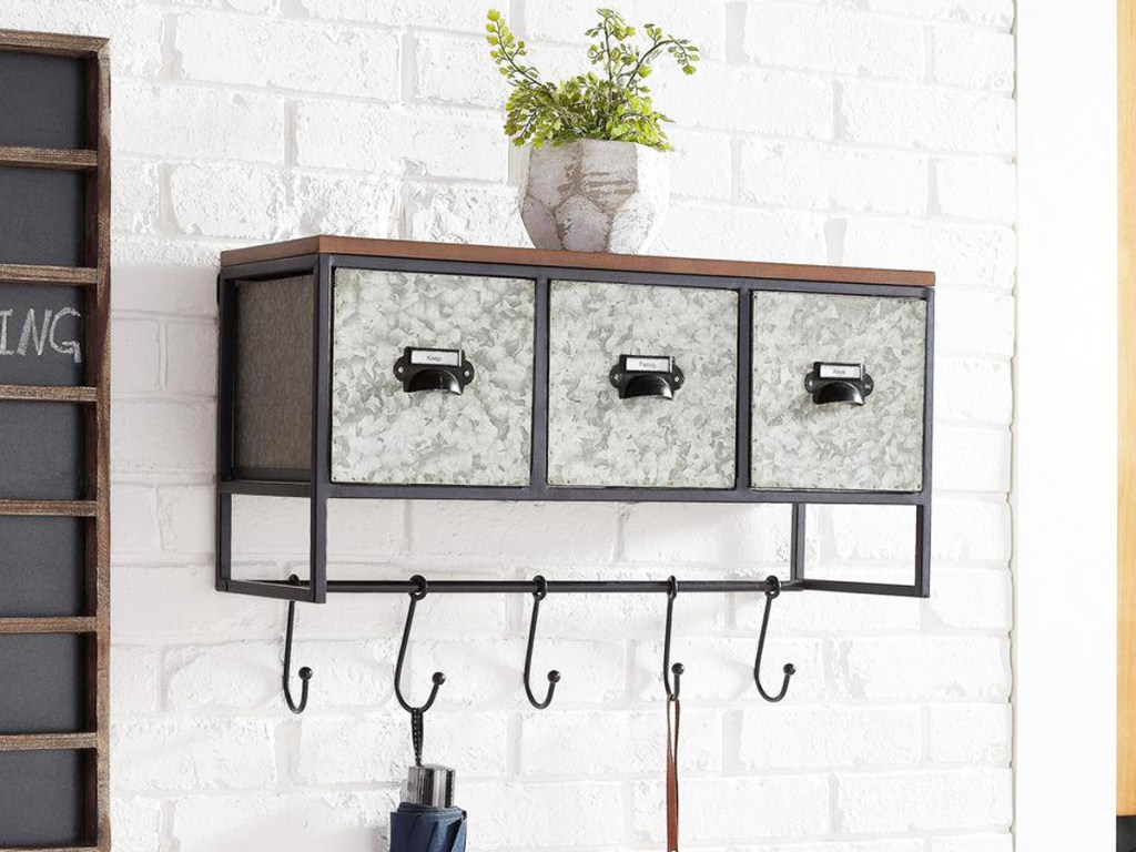 wall organizer with metal bins and hooks at the bottom