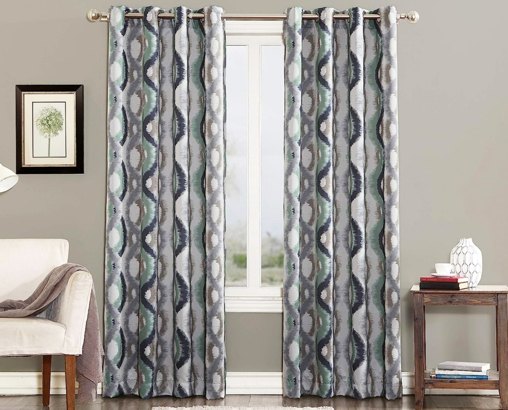 white, grey, and blue printed curtains