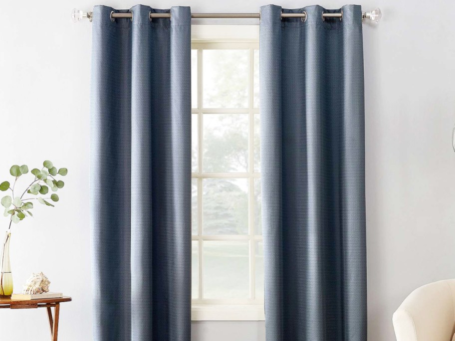 navy blue curtain panels over window