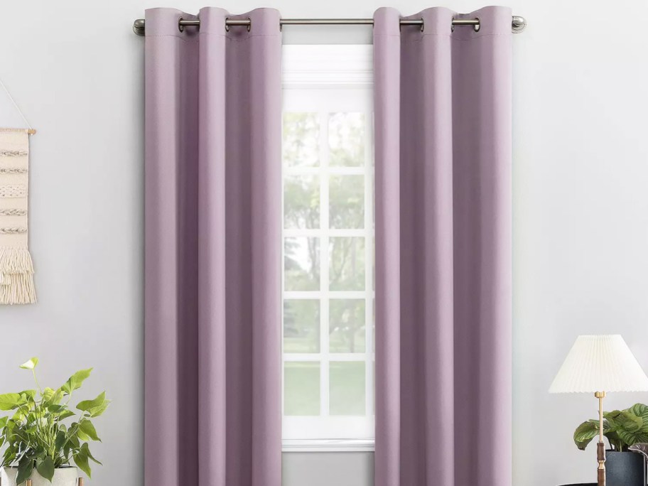 purple blackout curtains over window