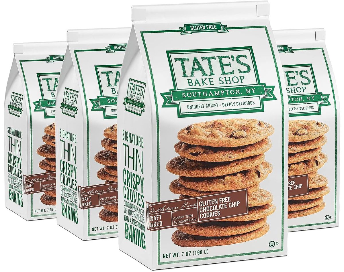 4 bags of Tate's Bake Shop Gluten Free Chocolate Chip Cookies on a white marble counter