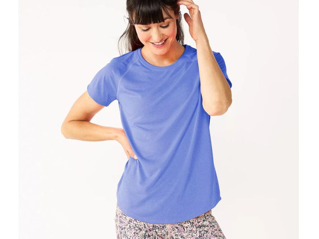 A woman in a blue t-shirt