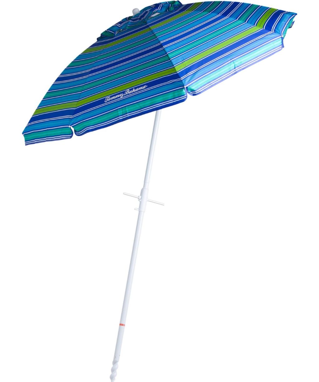 Blue and green beach umbrella with a white pole