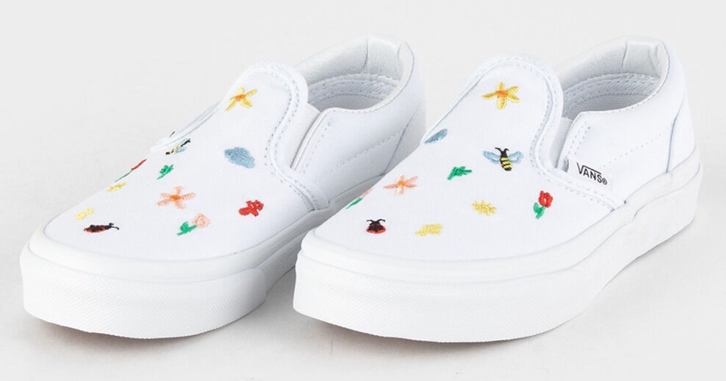 white slip on shoes with floral embroidery