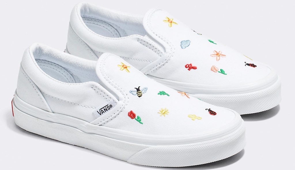 white slip on shoes with floral embroidery