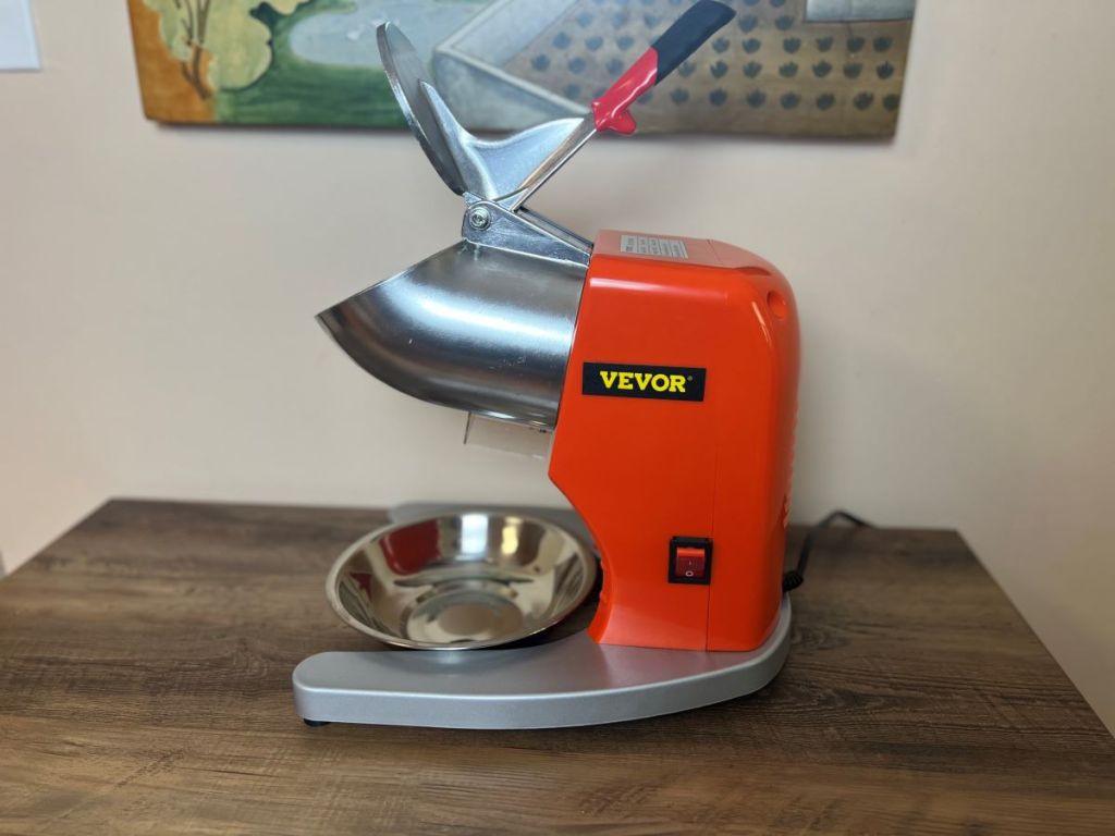 Vevor Electric Ice Shave and Crusher sitting on a table