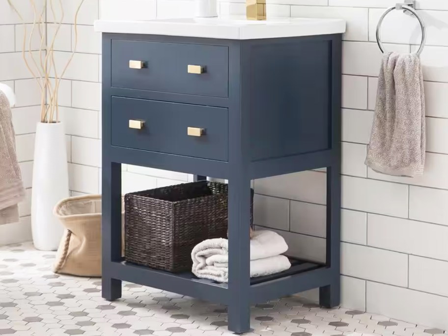 navy blue bathroom vanity with marble top