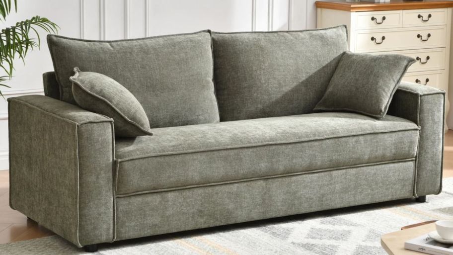 Wayfair upholstered sofa on top of a rug