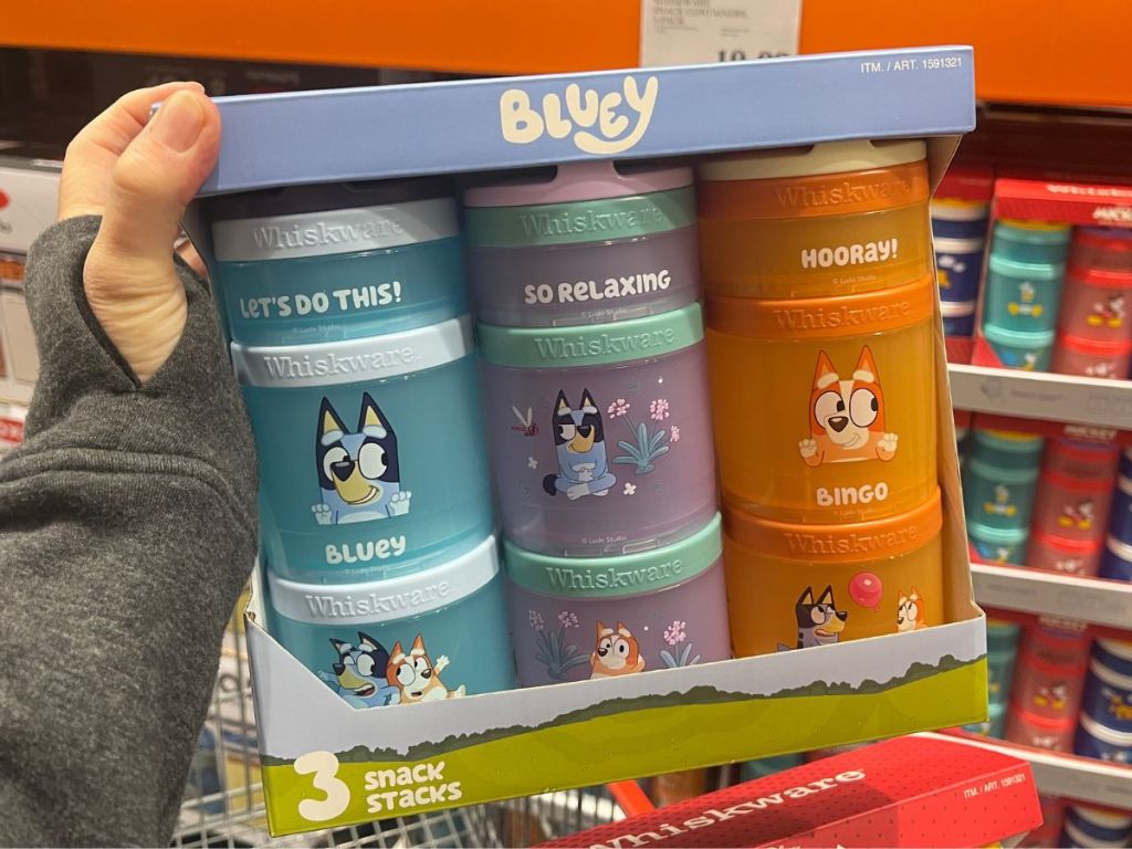 hand holding a Bluey Whiskware Snack Container set at Costco
