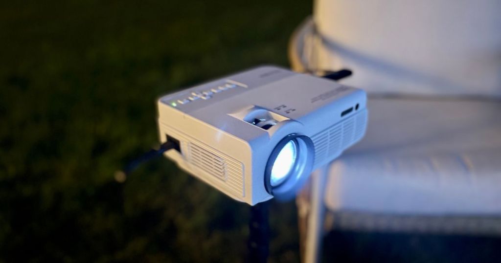 projector on tripod in backyard 