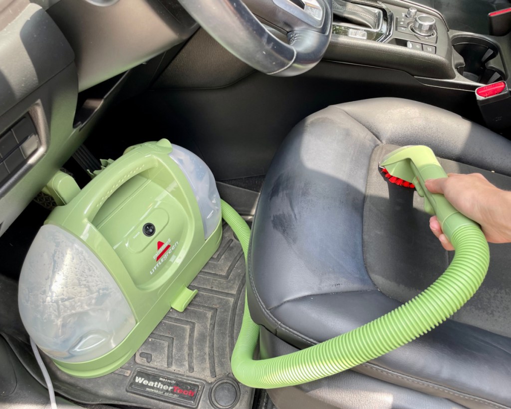 carpet cleaner cleaning inside car