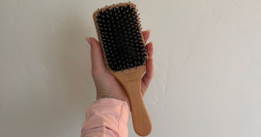 Boar Bristle Hair Brush in hand