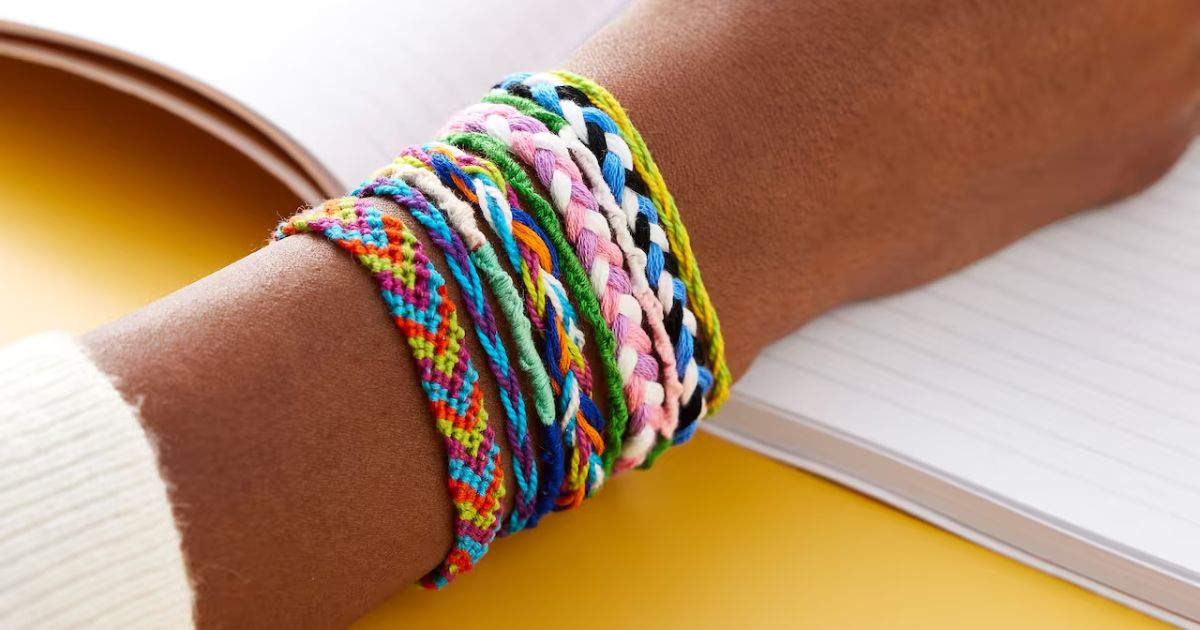 arm with lots of braided bracelets
