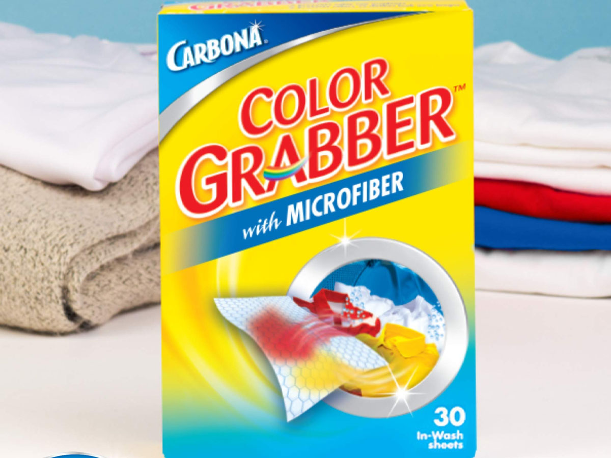carbona color grabber box on table with towels behind it