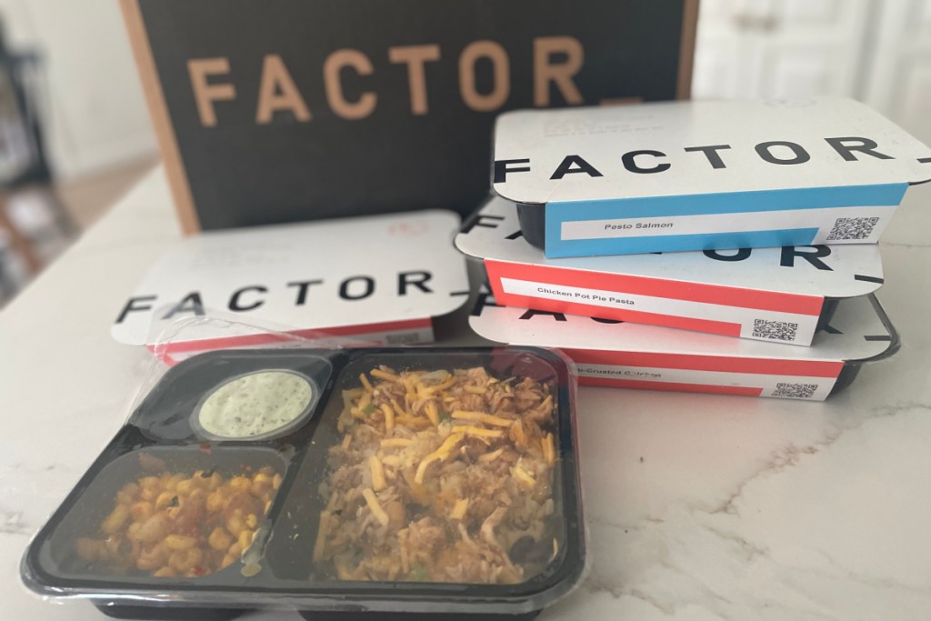 several factor prepared meals in front of box