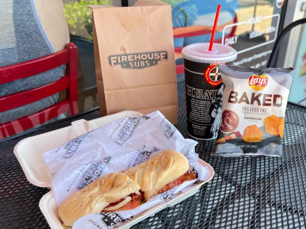 firehouse sub displayed with soda, and chips