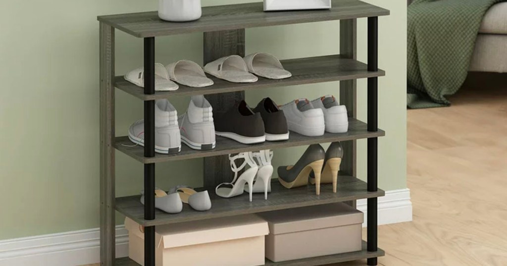 5 tier gray wooden shoe rack full of shoes