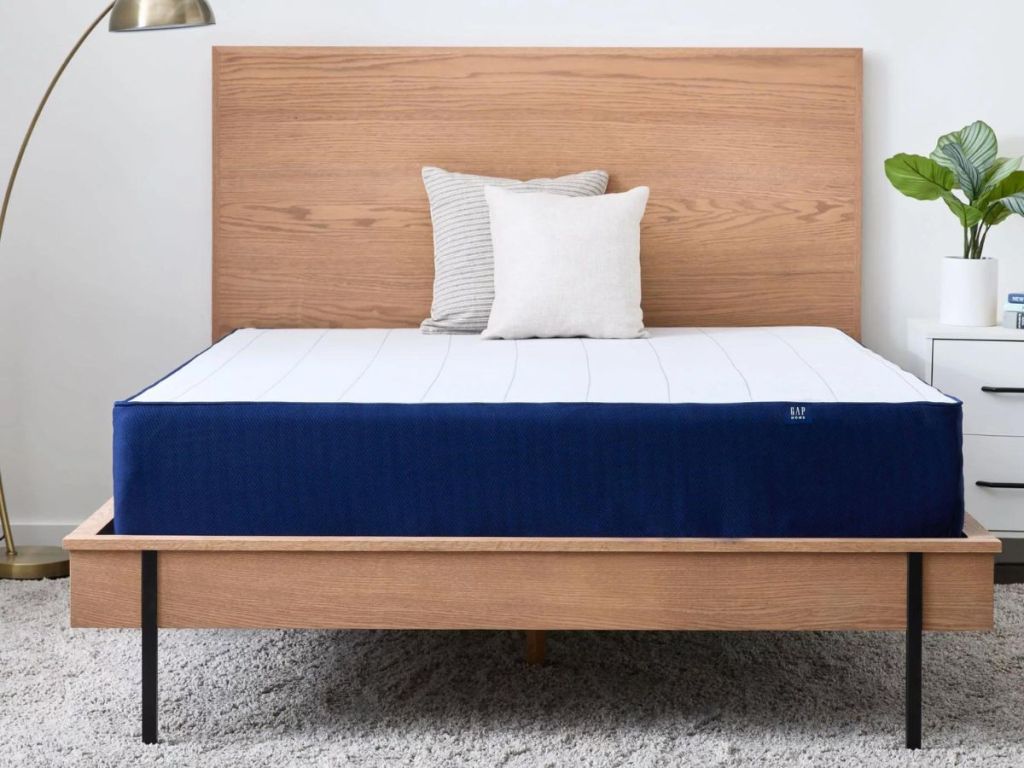 gap home mattress on natural wood bed frame