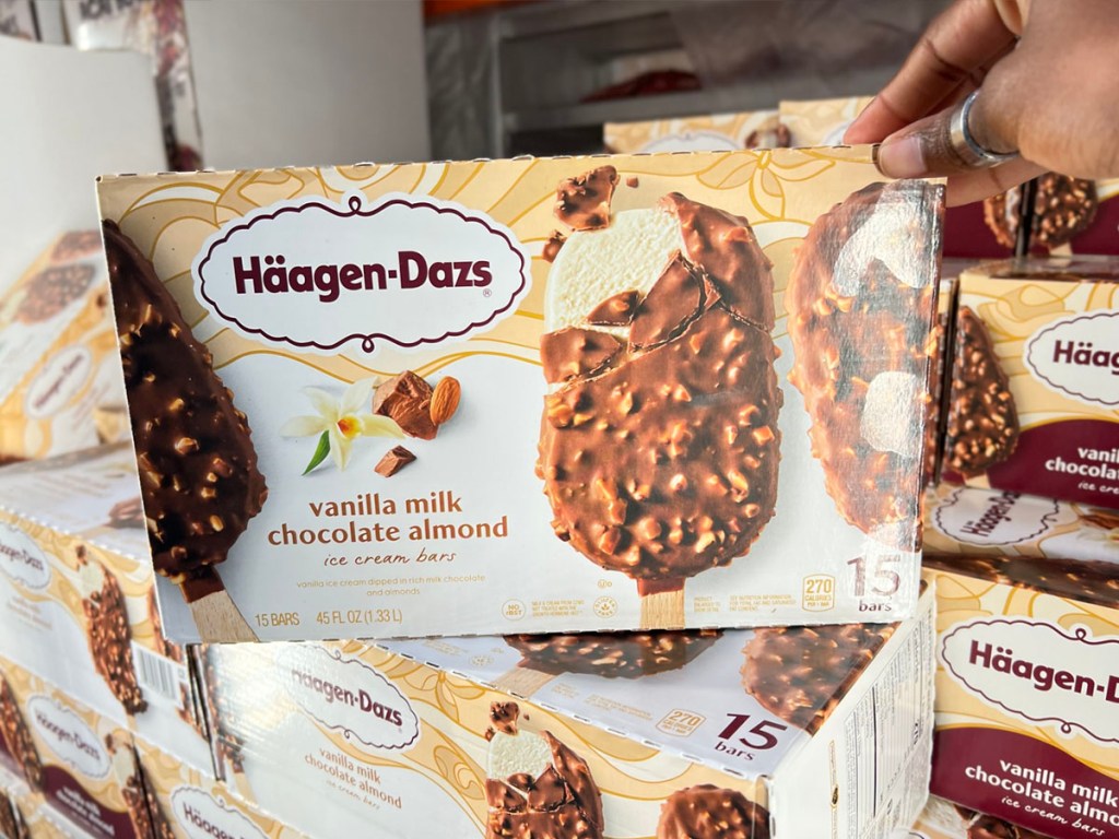 hand holding haagen dazs ice cream bar