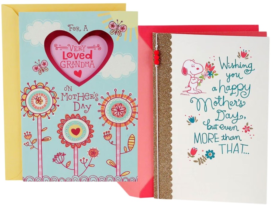 2 different Mother's Day cards with envelopes, noe with a heart and flowers, the other with Snoopy and flowers