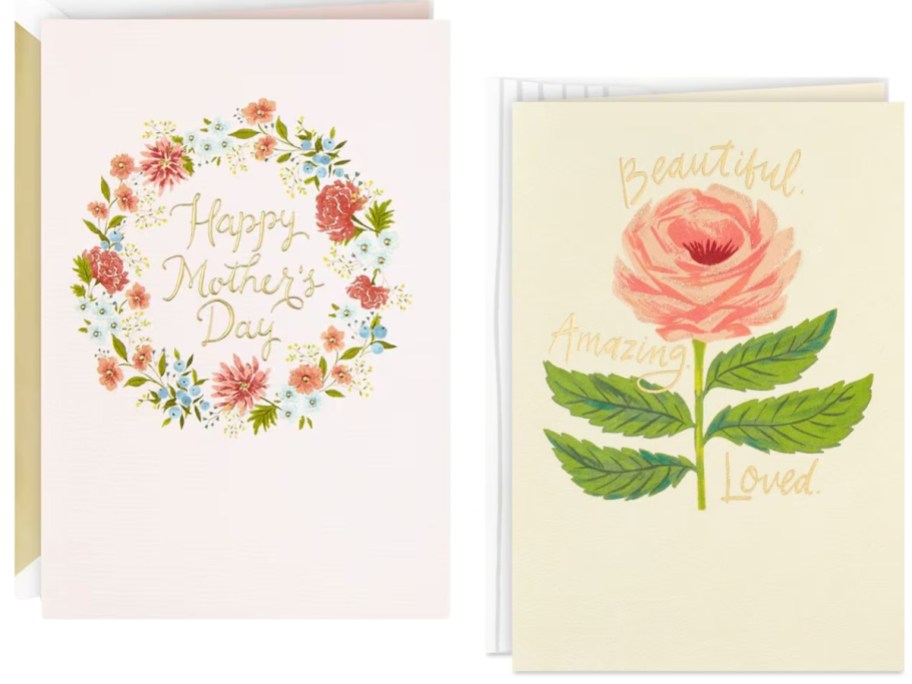 2 different Mother's Day cards with envelopes, 1 with a floral wreath, the other with a large pink rose.