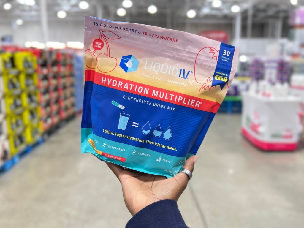 hand holding Liquid I.V. Hydration Multiplier Variety 30 Pack at the store