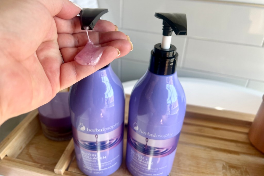 pumping purple shampoo into hand