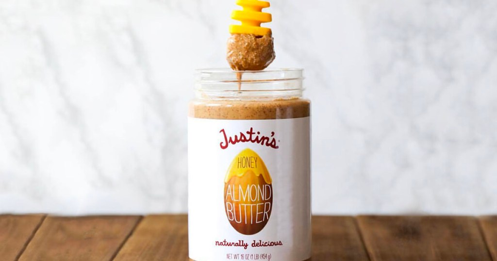 justins honey almond butter jar open on table