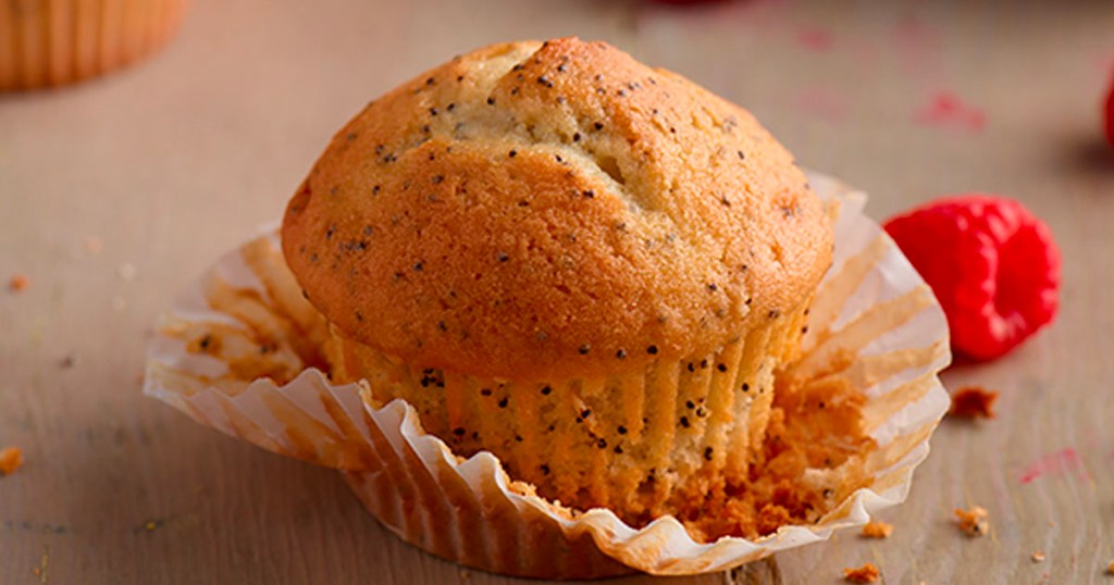 krusteaz almond poppy seed muffin in wrapper on counter