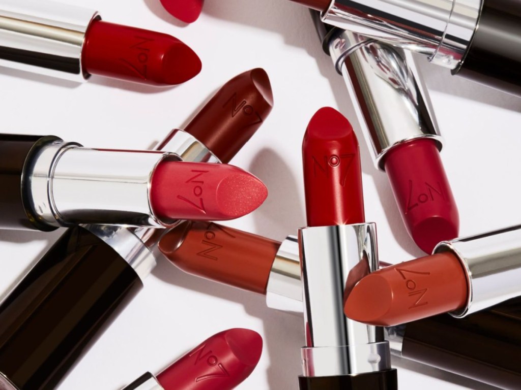 many lipsticks without lids in a pile