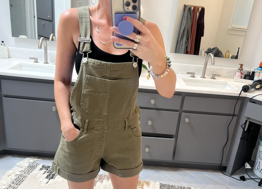 woman wearing no boundaries overalls from Walmart 