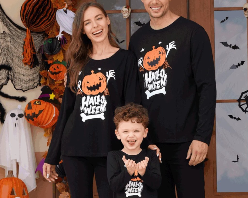 family wearing matching halloween shirts