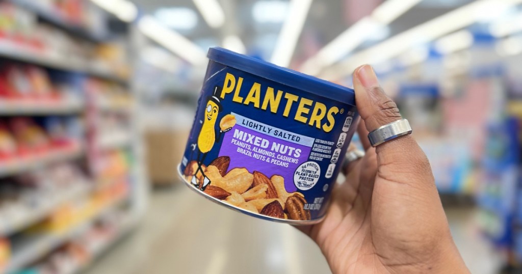 planters mixed nuts in a hand